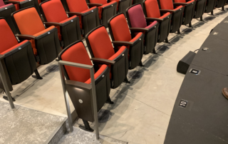 Displacement ventilation beneath auditorium seats
