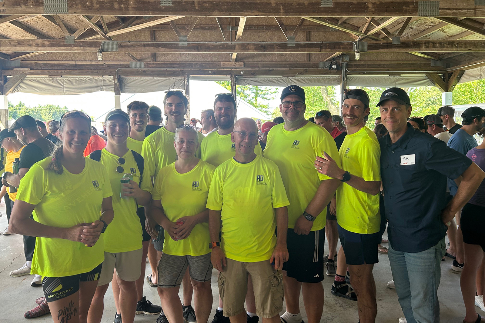 Ring & DuChateau staff enjoy a break playing ping pong